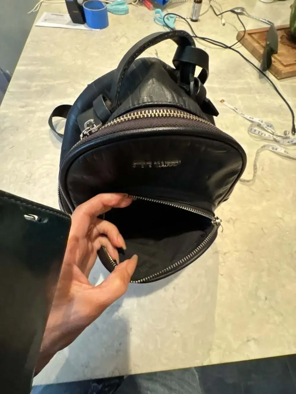 Steve Madden Black Mini Backpack Purse with Embossed Logo and Tassel